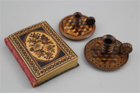 Two Tunbridge ware rosewood perspective cube chambersticks and a flower bouquet mosaic fronted photo album, 5in.